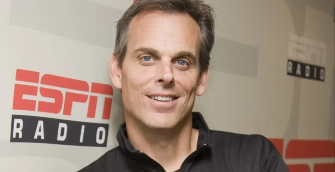 Smiling man in a black jacket