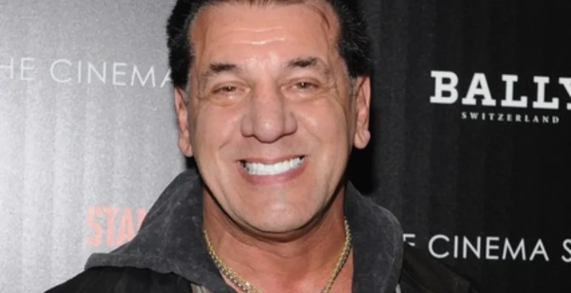 Smiling man in a dark jacket