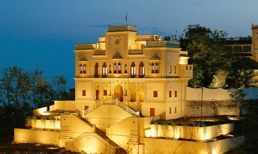 Illuminated by warm lights, a grand, historic building-luxury wellness retreats