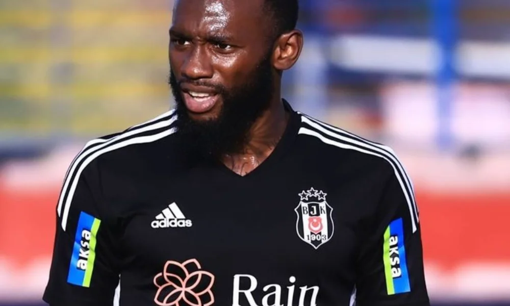Football player in a black Besiktas jersey