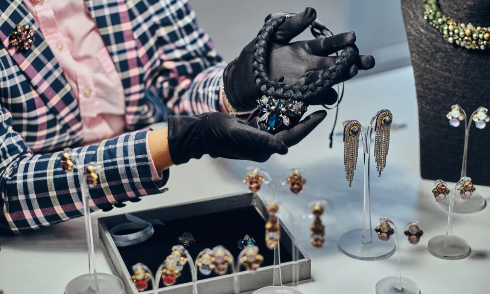 braided necklace adorned with blue gemstones-luxury jewelry trends